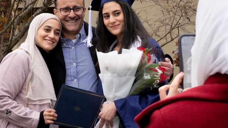 Family celebrating a new graduate